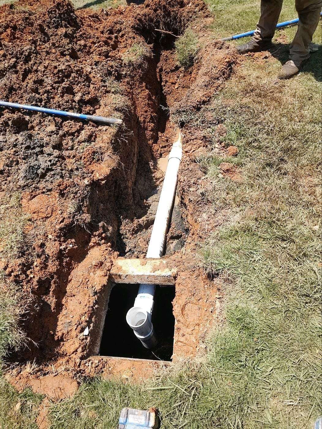 SFI Environmental crew performing septic and wastewater work at a job site in North Alabama