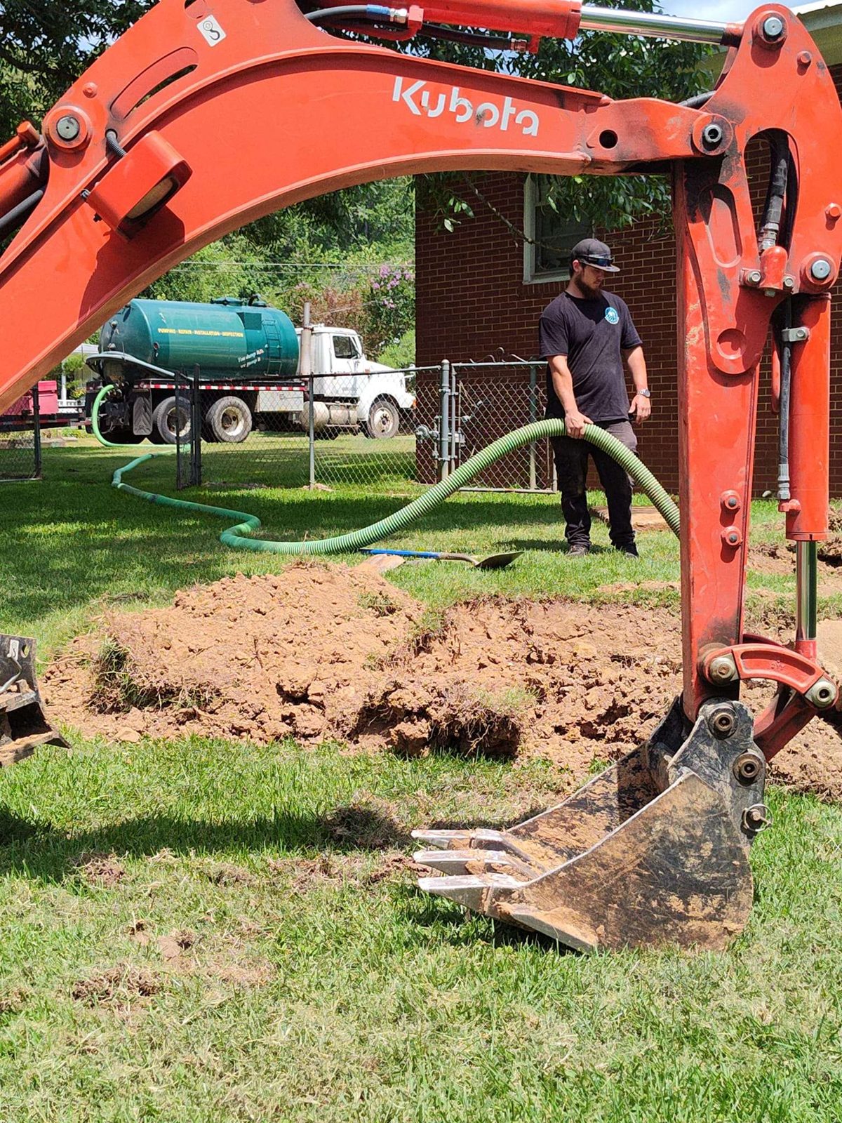 SFI Environmental crew performing septic and wastewater work at a job site in North Alabama