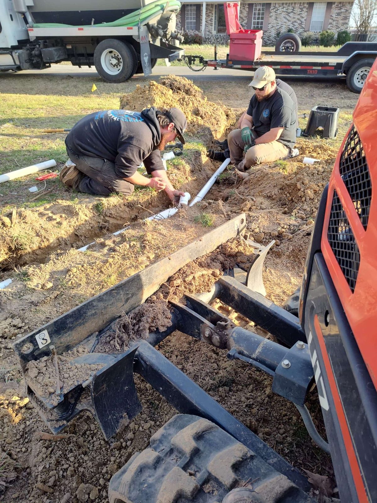 SFI Environmental crew performing septic and wastewater work at a job site in North Alabama