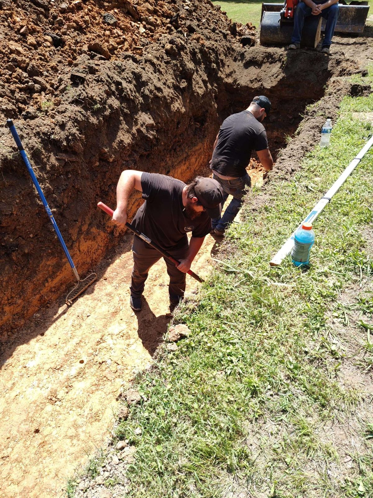 SFI Environmental crew performing septic and wastewater work at a job site in North Alabama