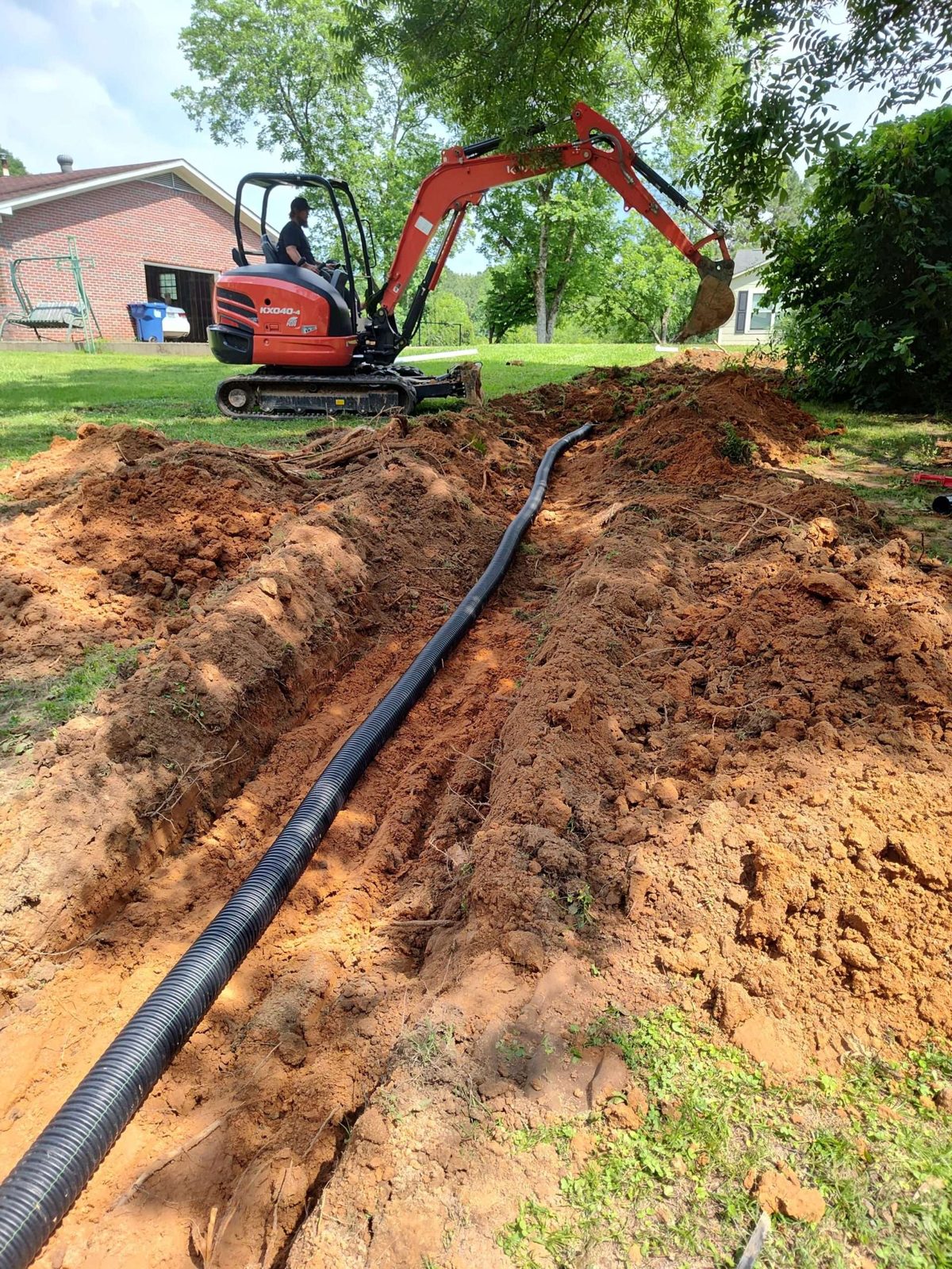 SFI Environmental crew performing septic and wastewater work at a job site in North Alabama