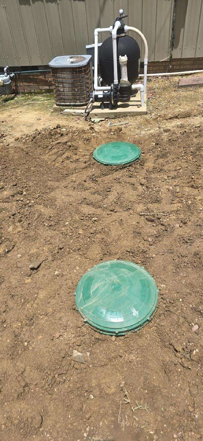 SFI Environmental crew performing septic and wastewater work at a job site in North Alabama