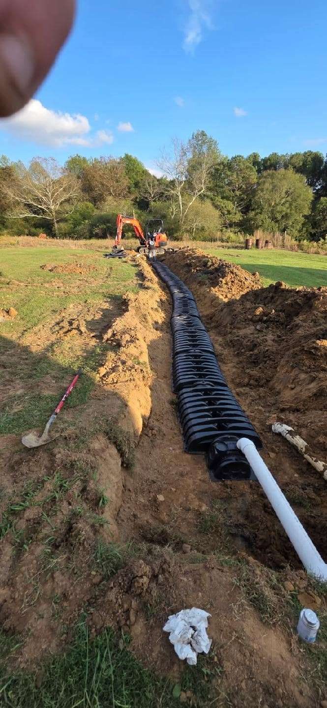 SFI Environmental crew performing septic and wastewater work at a job site in North Alabama