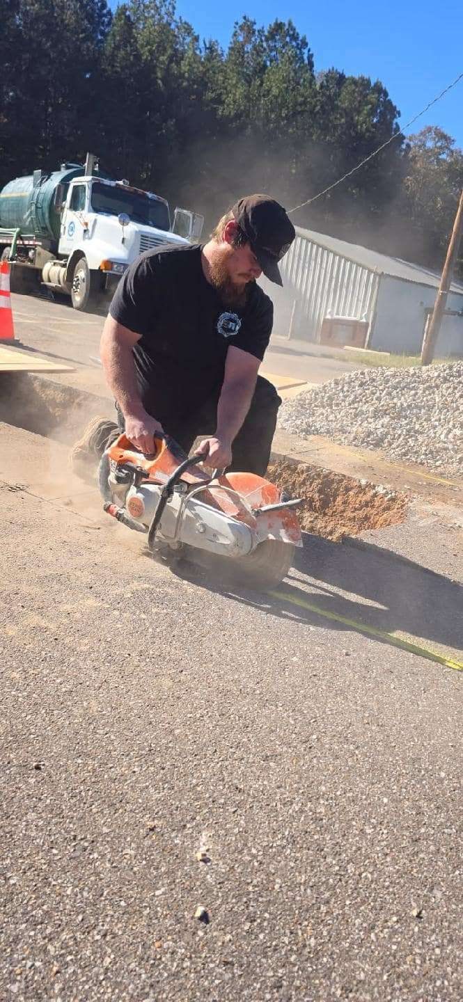 SFI Environmental crew performing septic and wastewater work at a job site in North Alabama